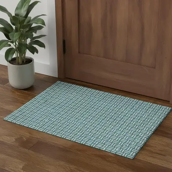 Teal And Ivory Abstract Geometric Washable Area Rug With UV Protection Photo 1