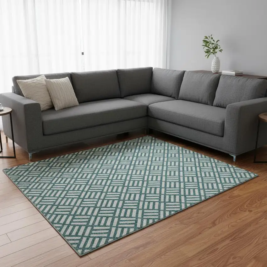 Teal And Ivory Abstract Geometric Washable Area Rug With UV Protection Photo 2