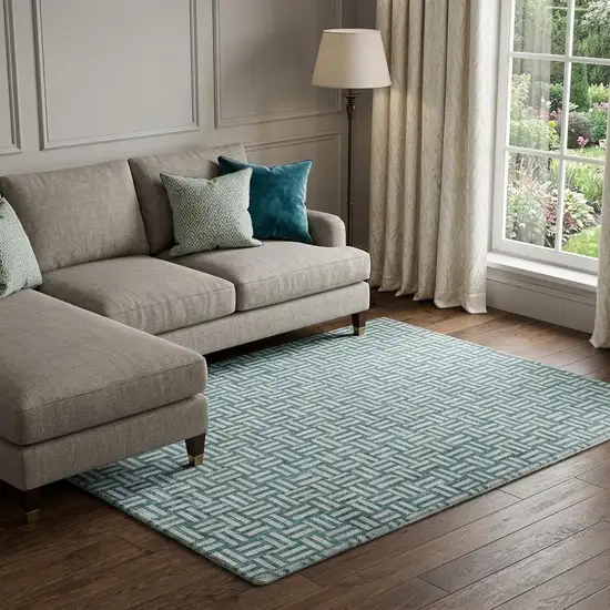 Teal And Ivory Abstract Geometric Washable Area Rug With UV Protection Photo 1