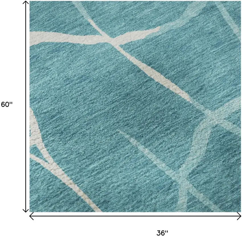Teal And Ivory Abstract Geometric Washable Area Rug With UV Protection Photo 9