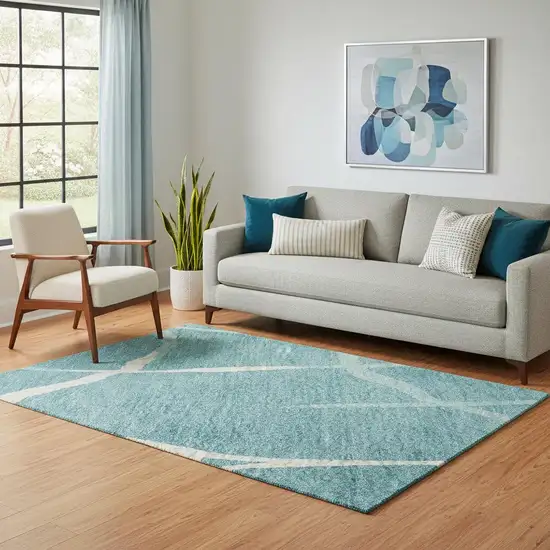 Teal And Ivory Abstract Geometric Washable Area Rug With UV Protection Photo 2