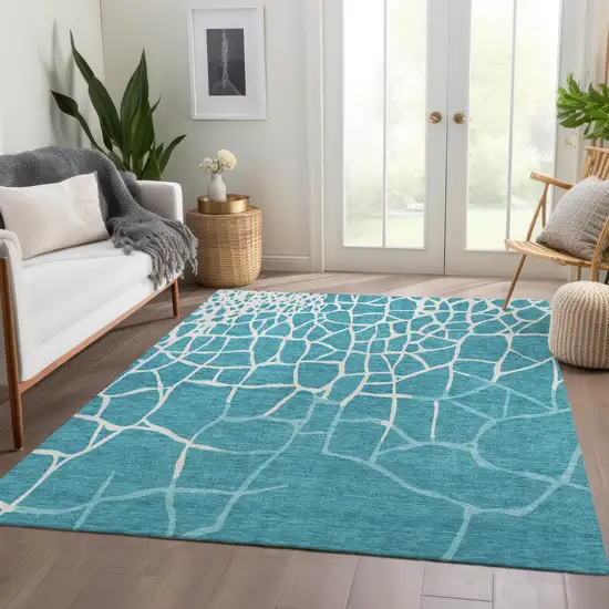 Teal And Ivory Abstract Geometric Washable Area Rug With UV Protection Photo 3