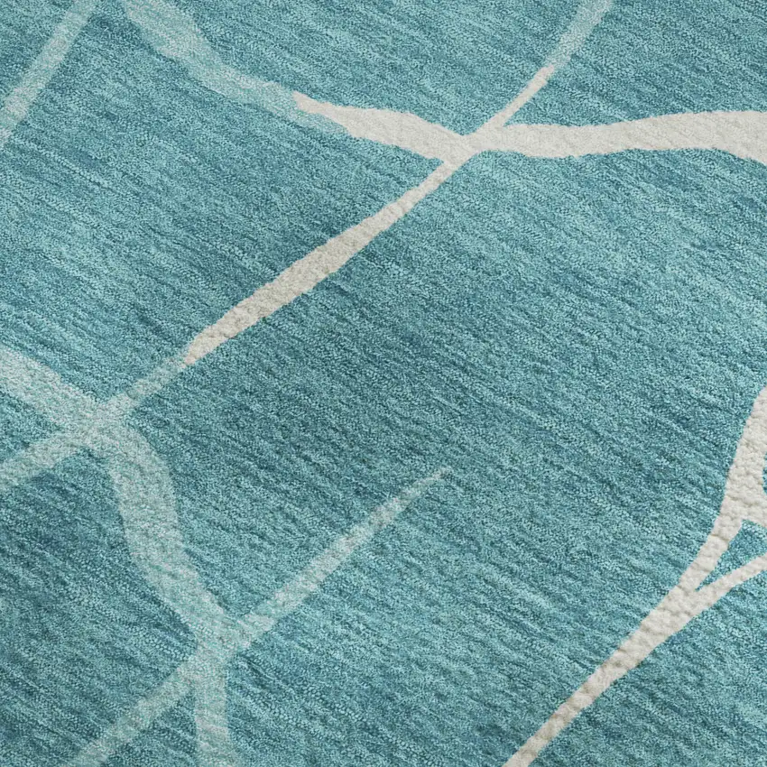 Teal And Ivory Abstract Geometric Washable Area Rug With UV Protection Photo 2