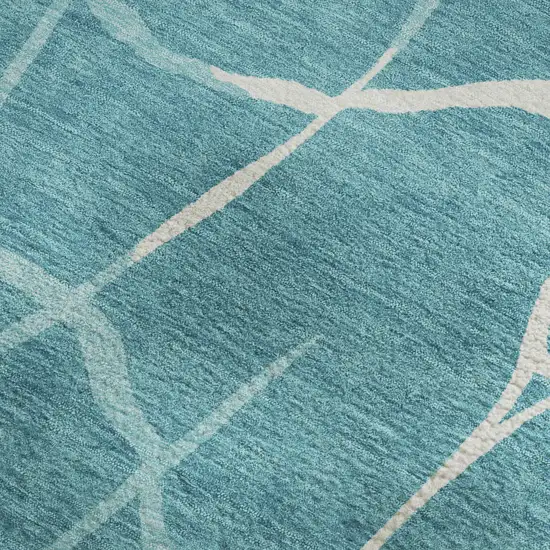 Teal And Ivory Abstract Geometric Washable Area Rug With UV Protection Photo 2