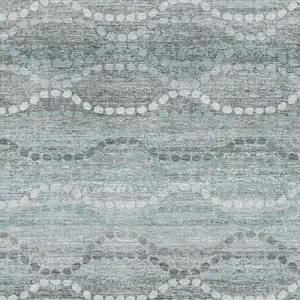 Photo of Teal And Ivory Abstract Geometric Washable Area Rug With UV Protection