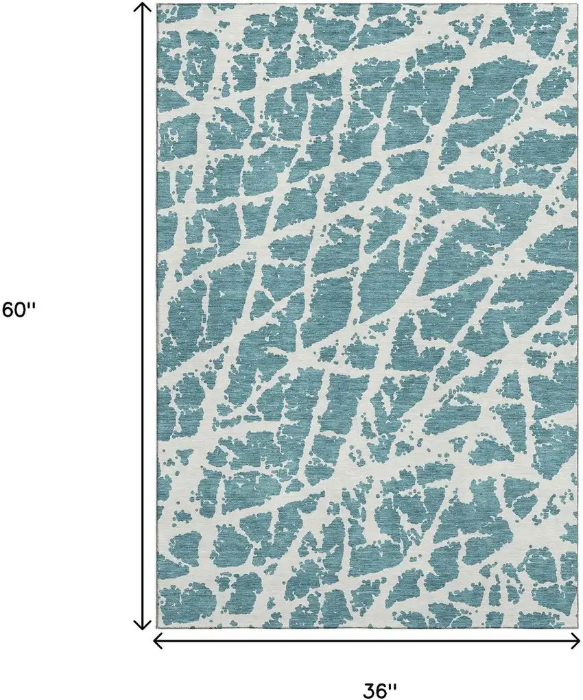 Teal And Ivory Abstract Washable Area Rug With UV Protection Photo 3