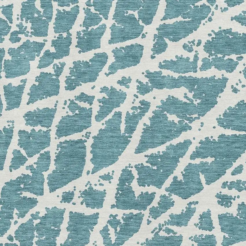 Teal And Ivory Abstract Washable Area Rug With UV Protection Photo 3