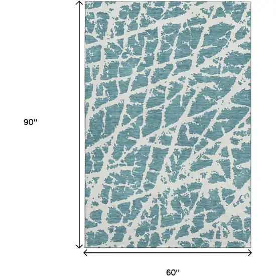 Teal And Ivory Abstract Washable Area Rug With UV Protection Photo 3