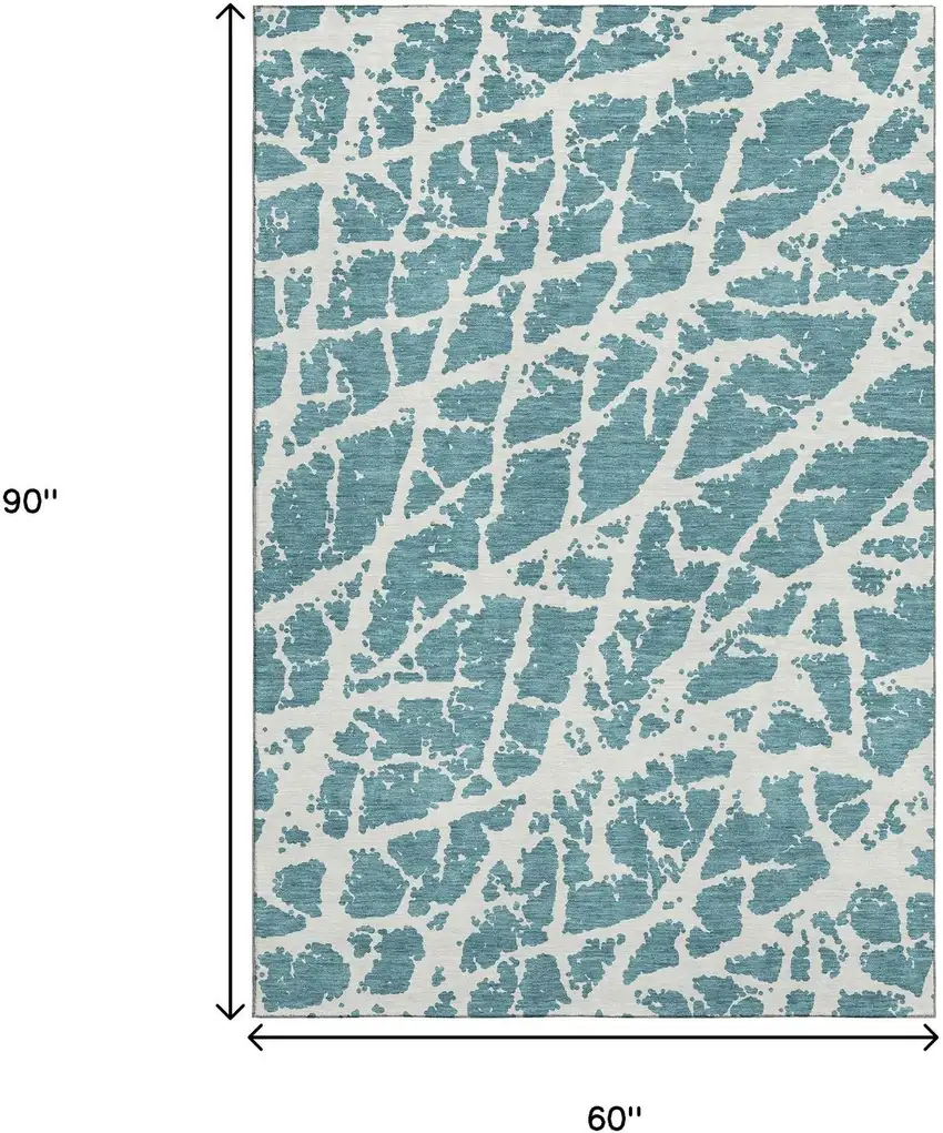 Teal And Ivory Abstract Washable Area Rug With UV Protection Photo 3