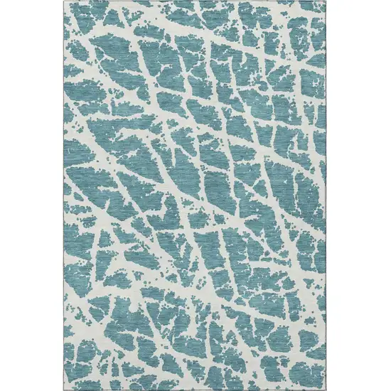 Teal And Ivory Abstract Washable Area Rug With UV Protection Photo 3
