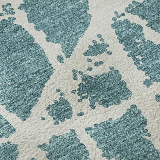 Teal And Ivory Abstract Washable Area Rug With UV Protection Photo 9