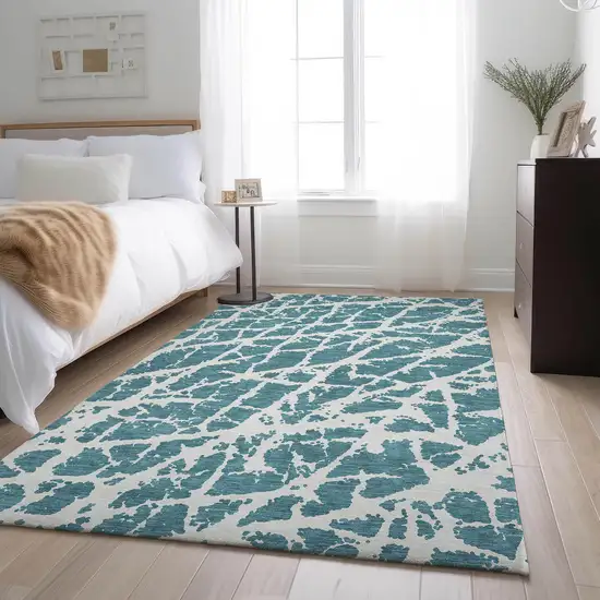 Teal And Ivory Abstract Washable Area Rug With UV Protection Photo 4
