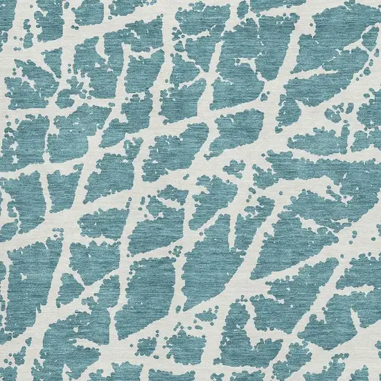 Teal And Ivory Abstract Washable Area Rug With UV Protection Photo 3