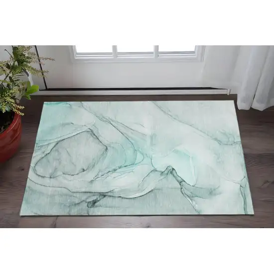 Teal And Ivory Abstract Washable Area Rug With UV Protection Photo 2