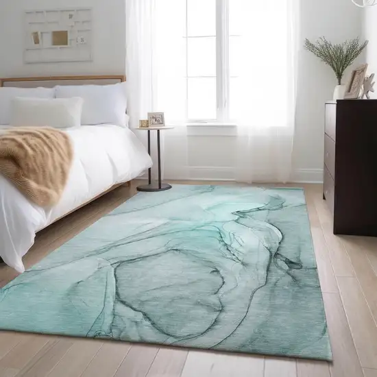 Teal And Ivory Abstract Washable Area Rug With UV Protection Photo 6