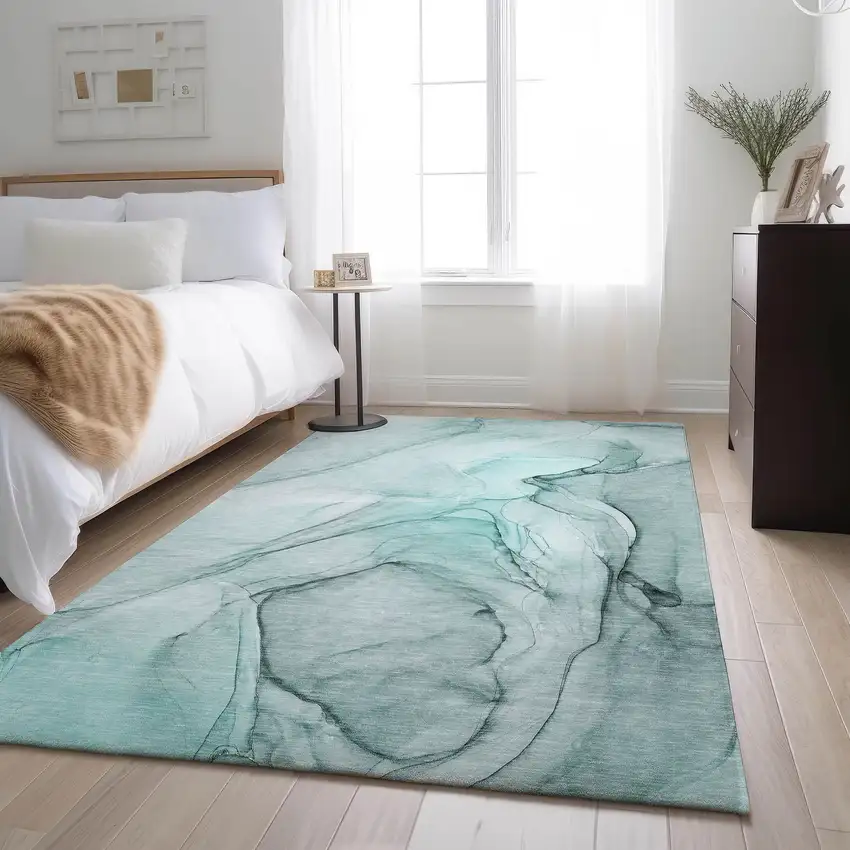 Teal And Ivory Abstract Washable Area Rug With UV Protection Photo 6