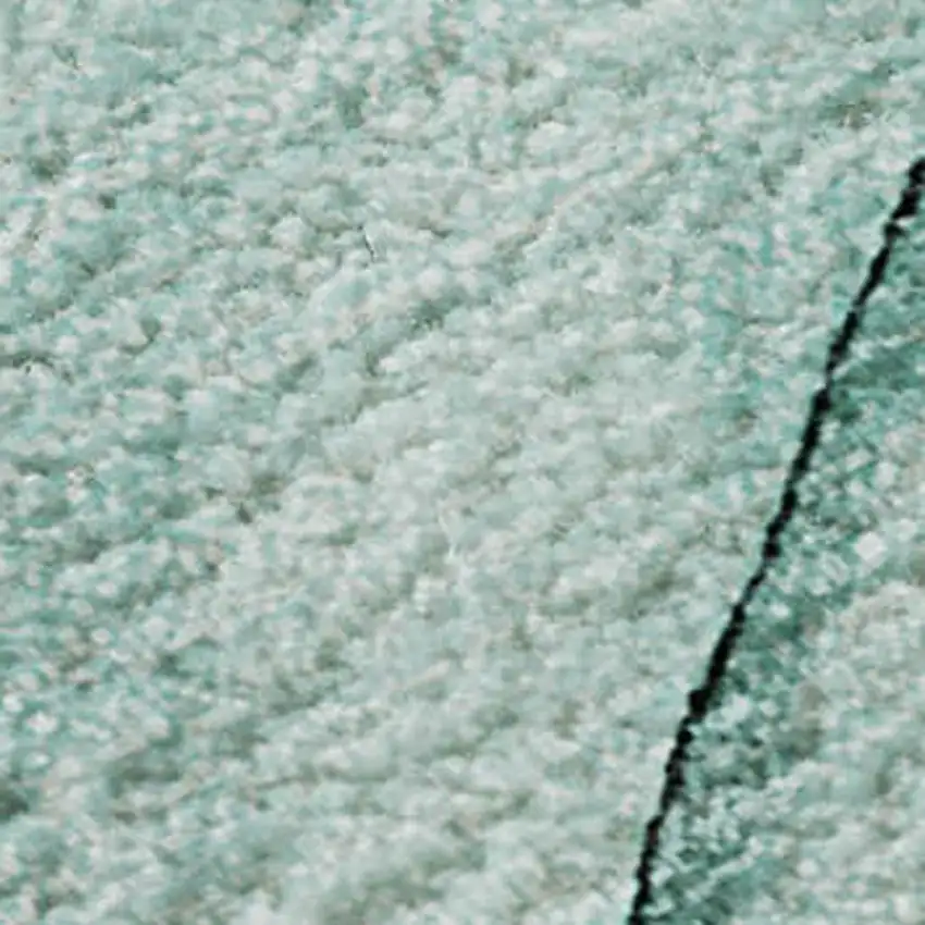 Teal And Ivory Abstract Washable Area Rug With UV Protection Photo 4