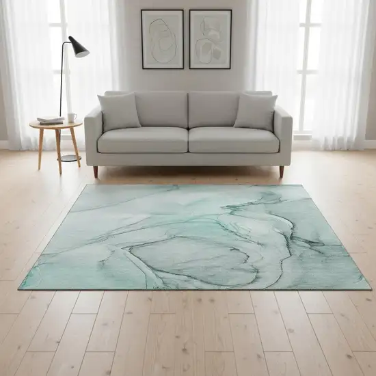 Teal And Ivory Abstract Washable Area Rug With UV Protection Photo 1