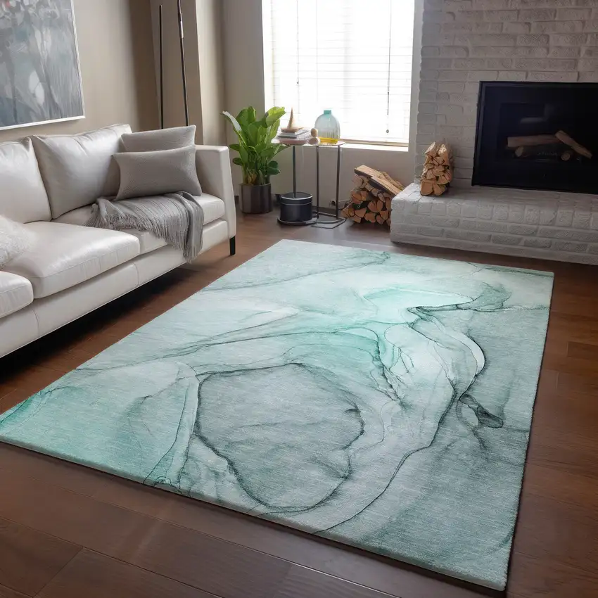 Teal And Ivory Abstract Washable Area Rug With UV Protection Photo 9