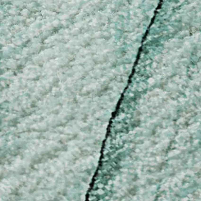 Teal And Ivory Abstract Washable Area Rug With UV Protection Photo 4