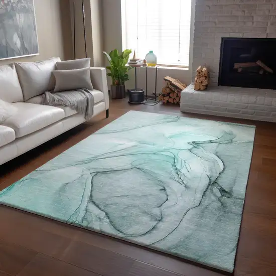 Teal And Ivory Abstract Washable Area Rug With UV Protection Photo 9