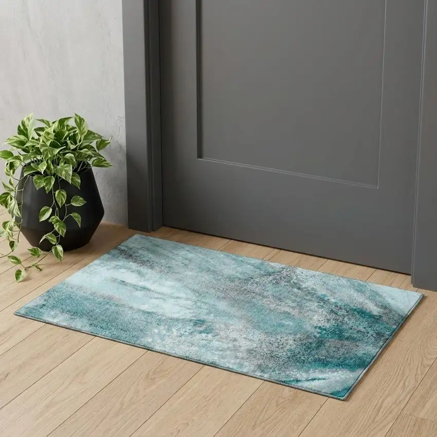 Teal And Ivory Abstract Washable Area Rug With UV Protection Photo 1