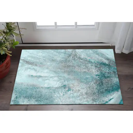 Teal And Ivory Abstract Washable Area Rug With UV Protection Photo 2