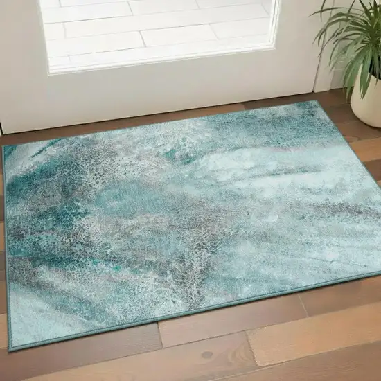 Teal And Ivory Abstract Washable Area Rug With UV Protection Photo 1