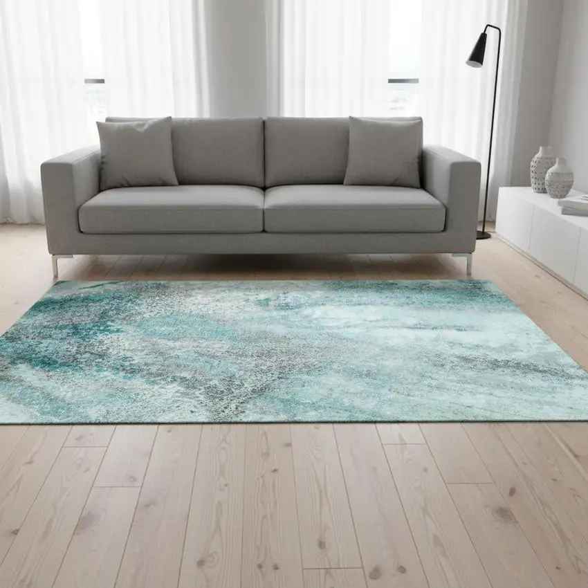 Teal And Ivory Abstract Washable Area Rug With UV Protection Photo 1