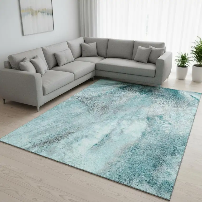 Teal And Ivory Abstract Washable Area Rug With UV Protection Photo 1