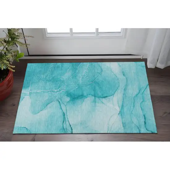 Teal And Ivory Abstract Washable Area Rug With UV Protection Photo 2