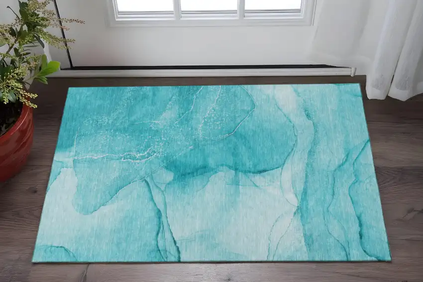 Teal And Ivory Abstract Washable Area Rug With UV Protection Photo 2
