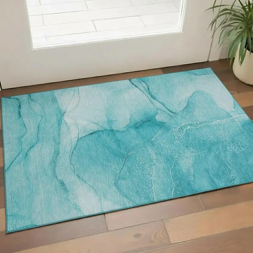 Teal And Ivory Abstract Washable Area Rug With UV Protection Photo 1