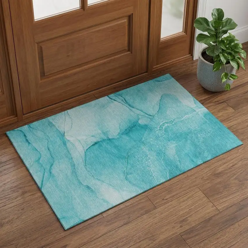 Teal And Ivory Abstract Washable Area Rug With UV Protection Photo 1