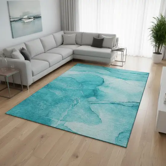 Teal And Ivory Abstract Washable Area Rug With UV Protection Photo 2