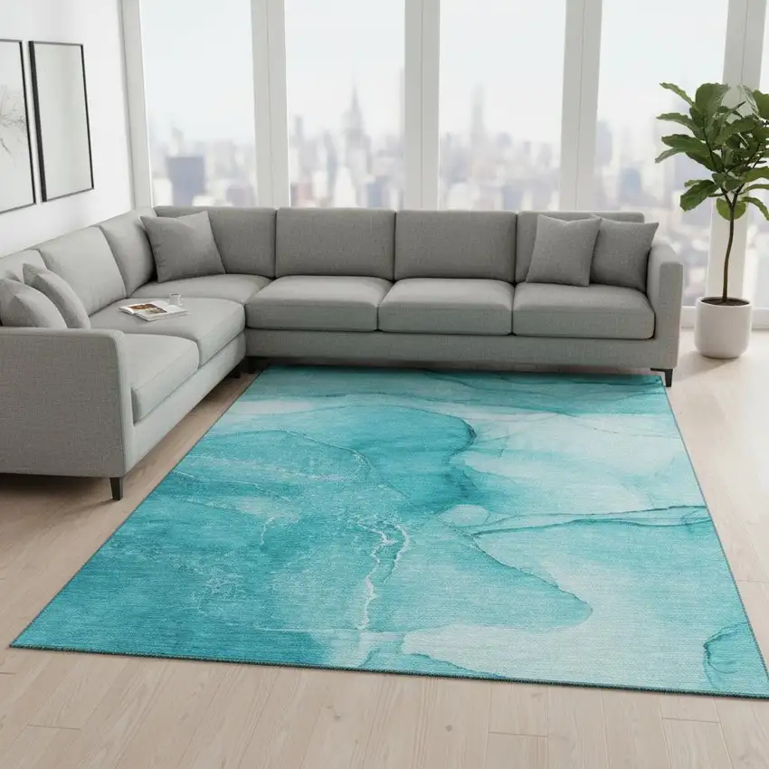 Teal And Ivory Abstract Washable Area Rug With UV Protection Photo 1