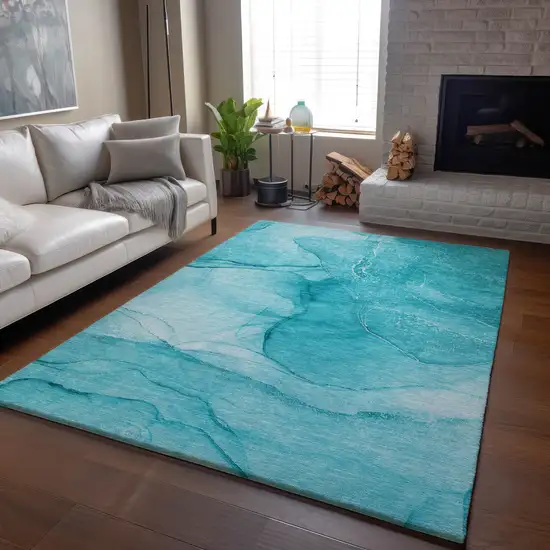 Teal And Ivory Abstract Washable Area Rug With UV Protection Photo 6