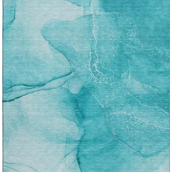 Teal And Ivory Abstract Washable Area Rug With UV Protection Photo 9