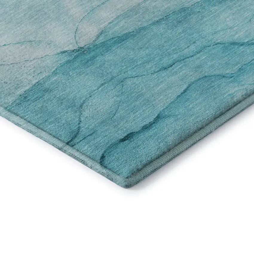 Teal And Ivory Abstract Washable Area Rug With UV Protection Photo 9