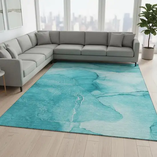Teal And Ivory Abstract Washable Area Rug With UV Protection Photo 1