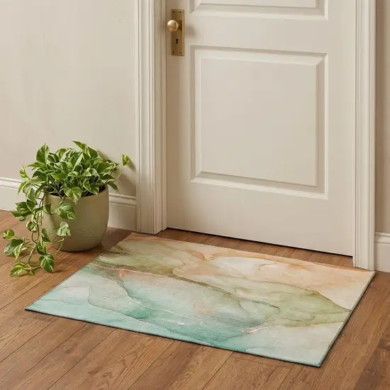 Teal And Ivory Abstract Washable Area Rug With UV Protection Photo 1