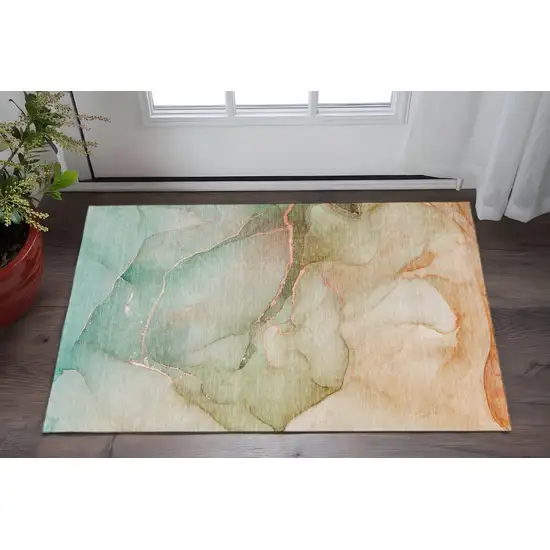 Teal And Ivory Abstract Washable Area Rug With UV Protection Photo 2