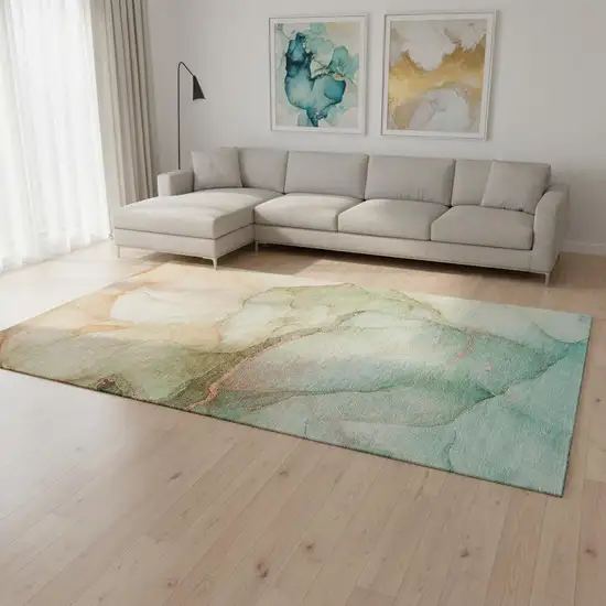 Teal And Ivory Abstract Washable Area Rug With UV Protection Photo 1
