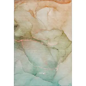 Photo of Teal And Ivory Abstract Washable Area Rug With UV Protection