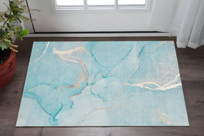 Teal And Ivory Abstract Washable Area Rug With UV Protection Photo 2