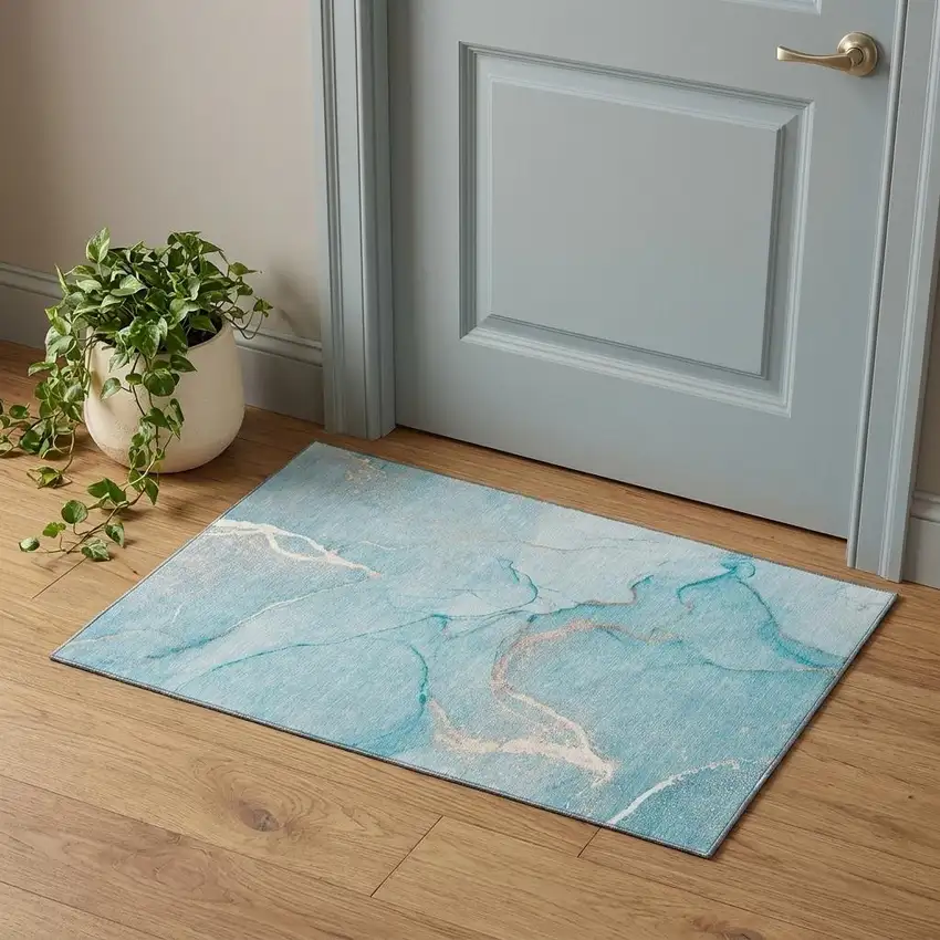 Teal And Ivory Abstract Washable Area Rug With UV Protection Photo 1