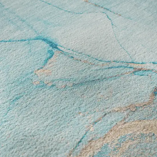 Teal And Ivory Abstract Washable Area Rug With UV Protection Photo 9