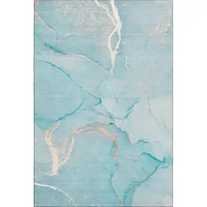 Photo of Teal And Ivory Abstract Washable Area Rug With UV Protection