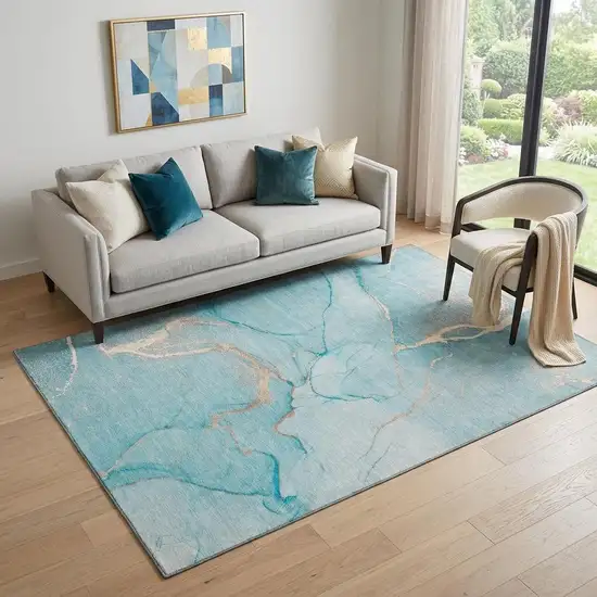 Teal And Ivory Abstract Washable Area Rug With UV Protection Photo 1
