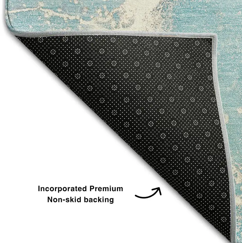 Teal And Ivory Abstract Washable Area Rug With UV Protection Photo 5